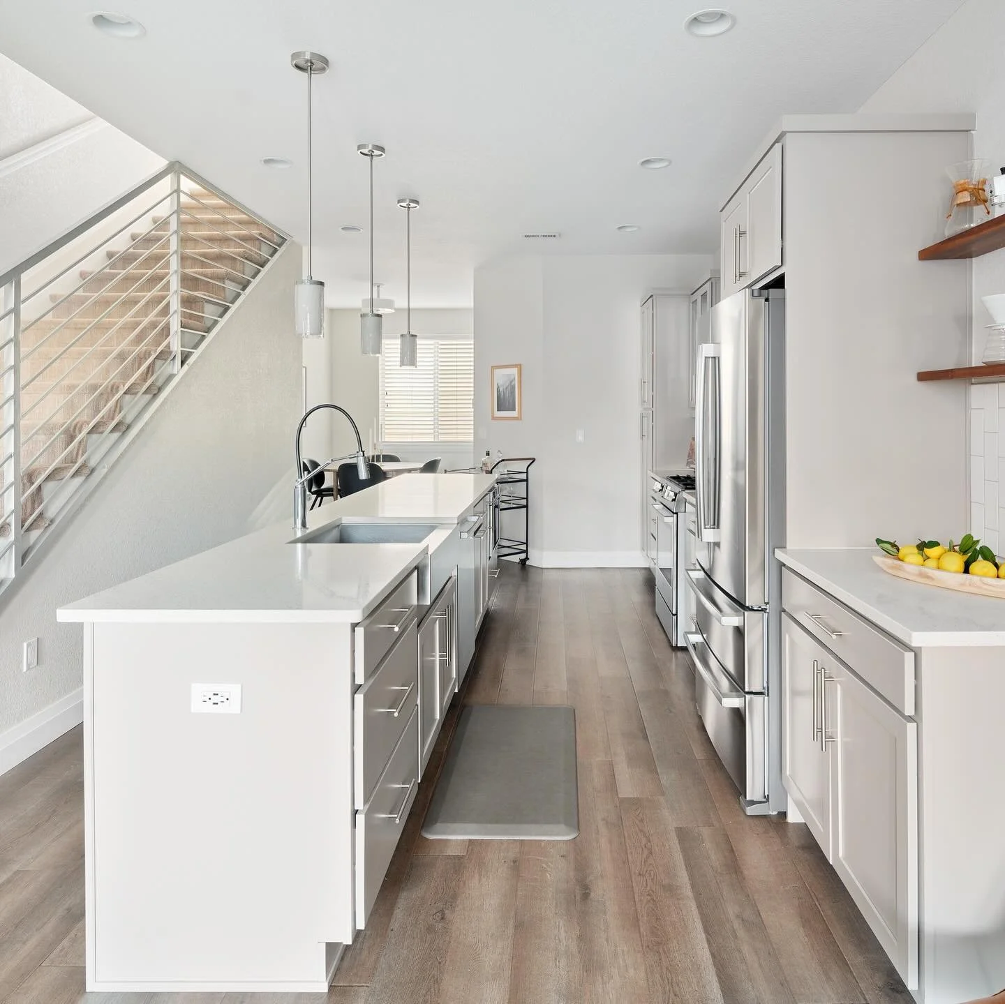 NEW Listing! Beautiful Sloan&rsquo;s Lake can be found just a block away from this stunning modern townhome. An ideal layout with three bedrooms and four bathrooms allows for entertaining on the main floor and bedroom privacy upstairs. Within blocks 