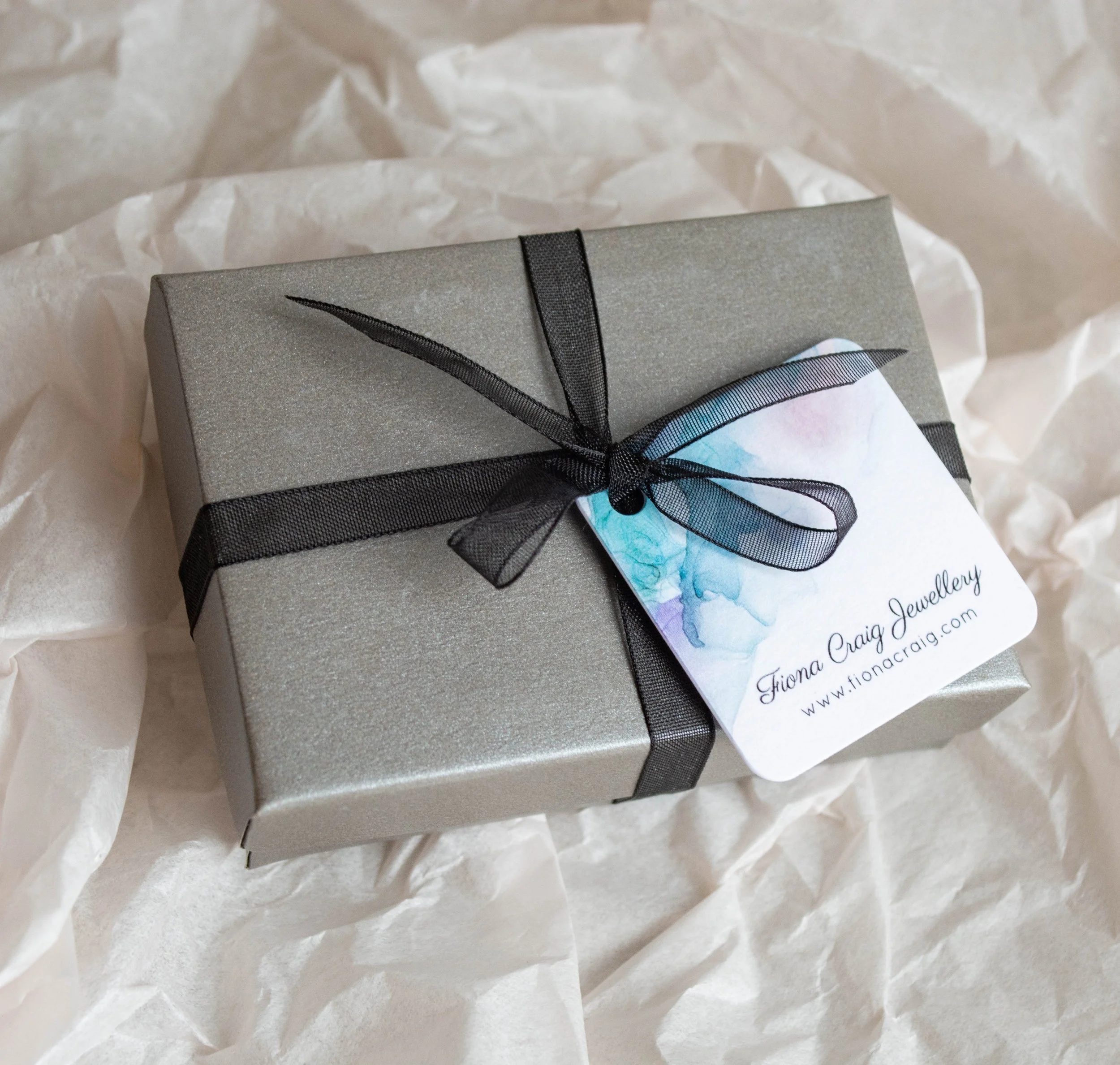 A-Box-with-Black-Ribbon-for-Earrings.jpg