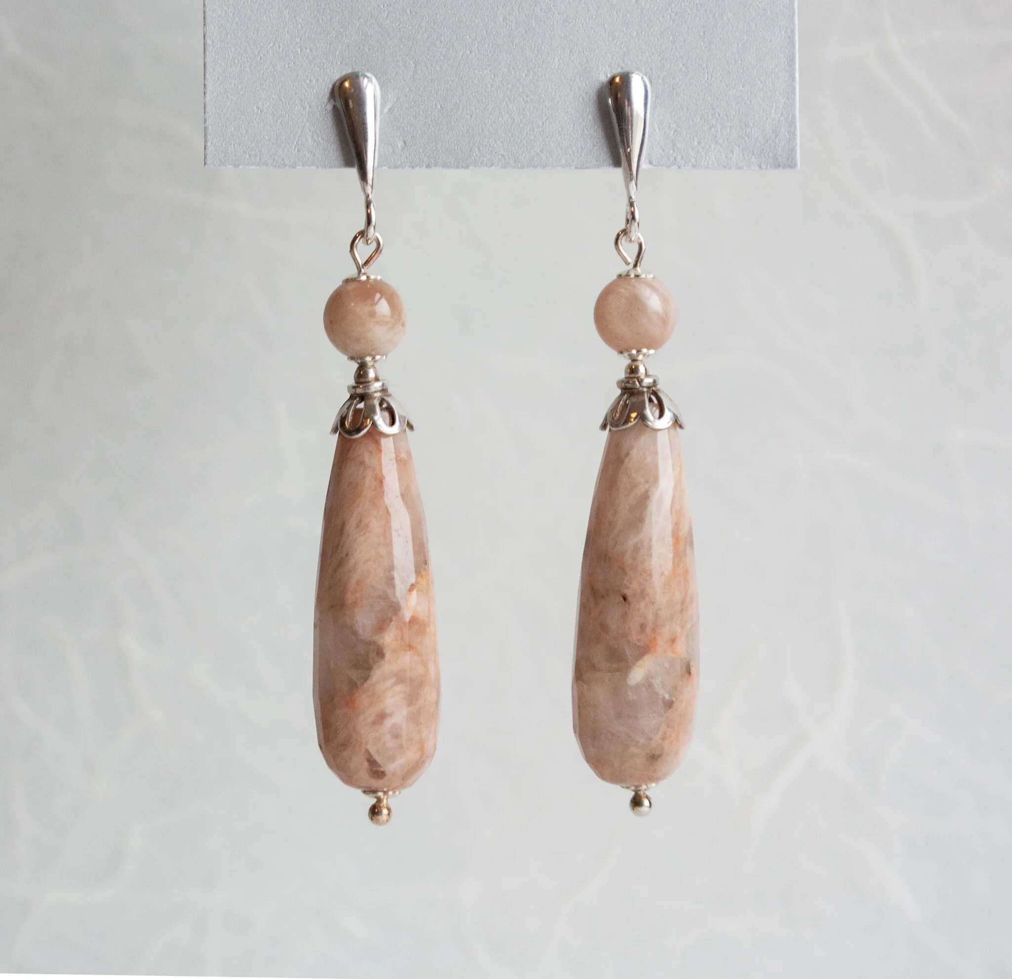 Sunstone-10x30-St.Silver-Teardrop-Earrings-1-F-Craig.jpg