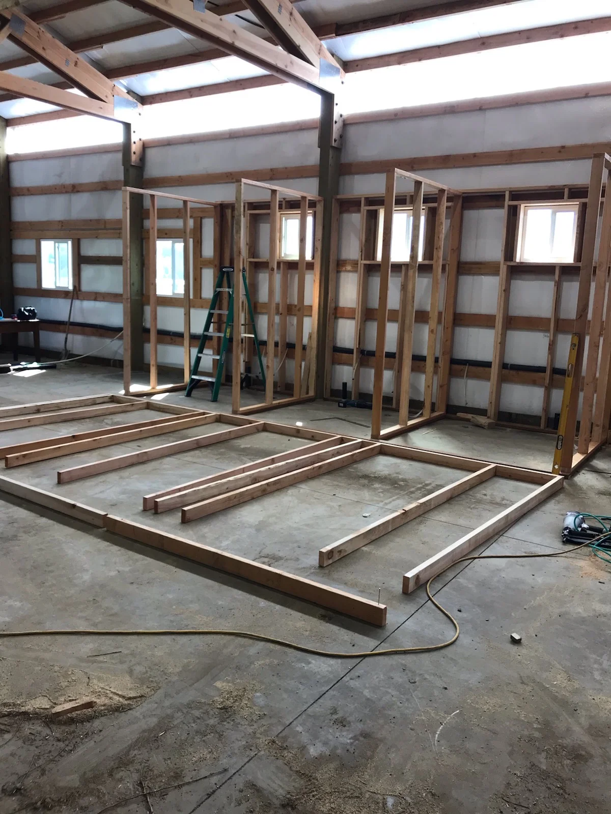 The basic framing going up for three bathrooms.