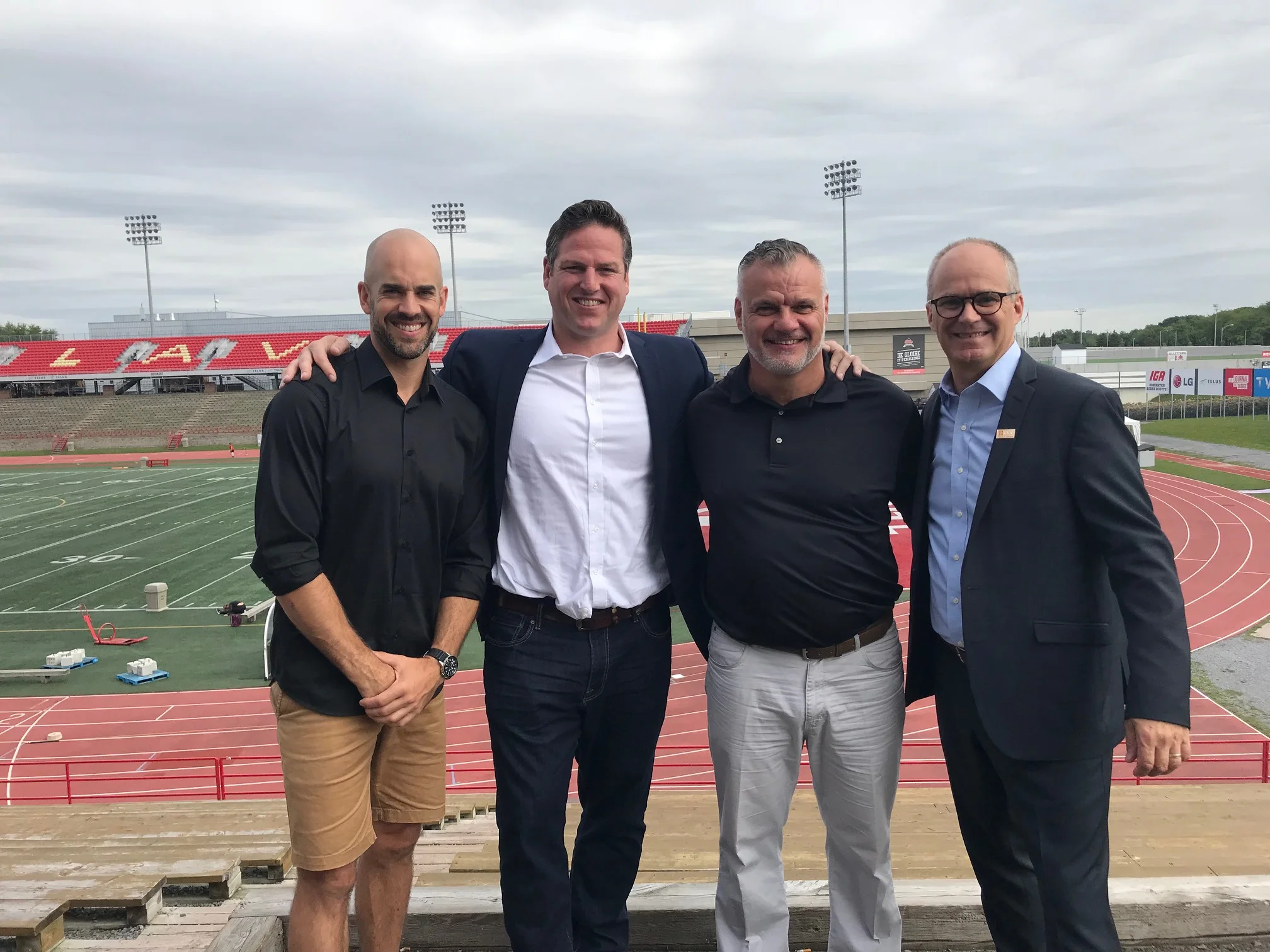 Proulx, Tim, Simon, and Laval Dean of Medicine.jpg