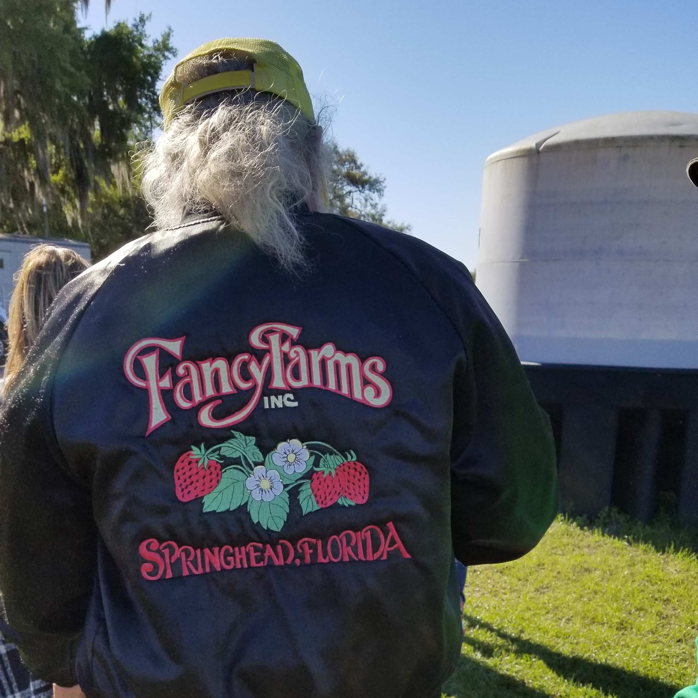 Fancy Farms in Plant City, Florida, is a family-owned operation run by Dustin Grooms and his father (in jacket), Carl Grooms.