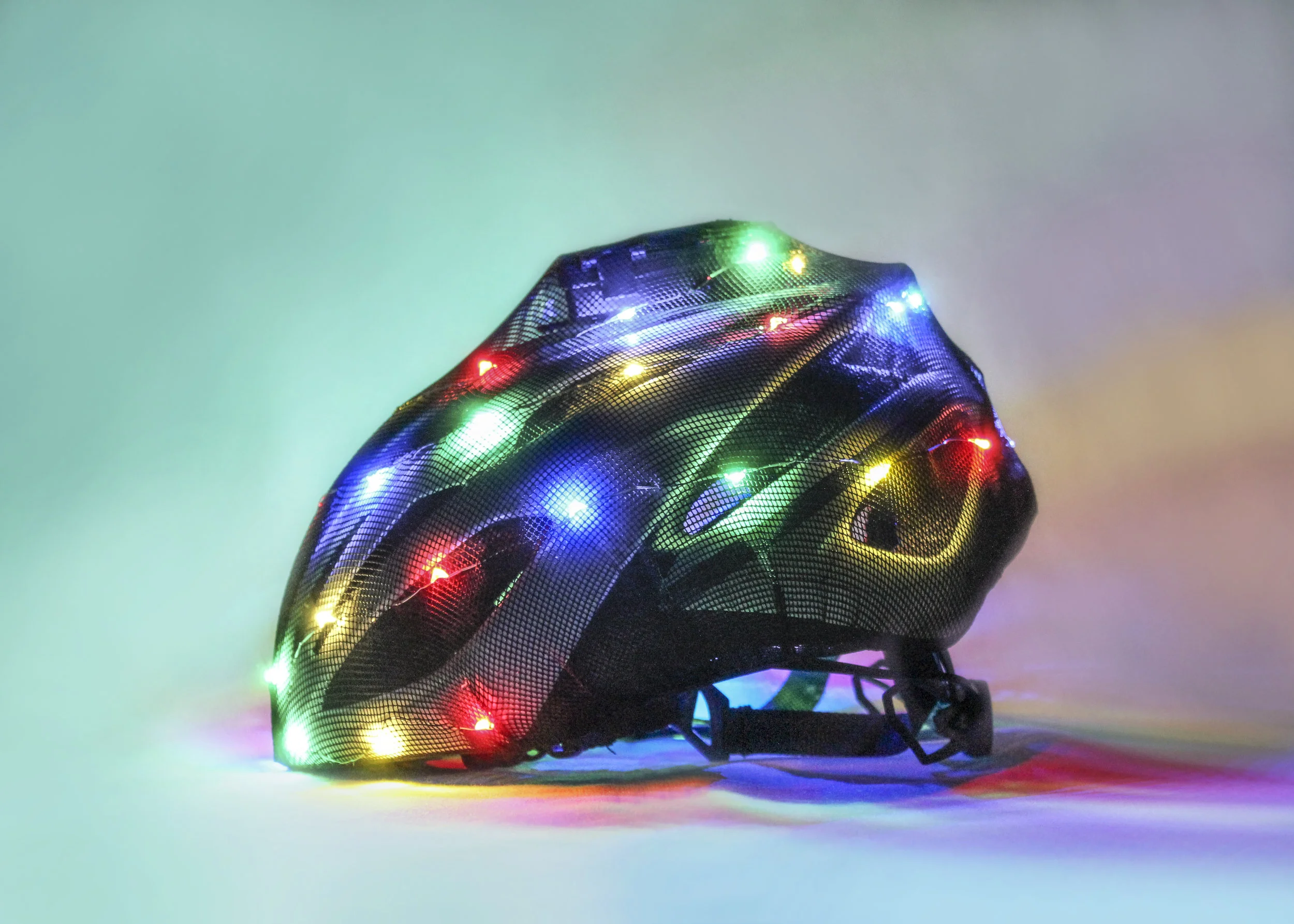 psycholights, a mesh helmet covering with bright lights embedded