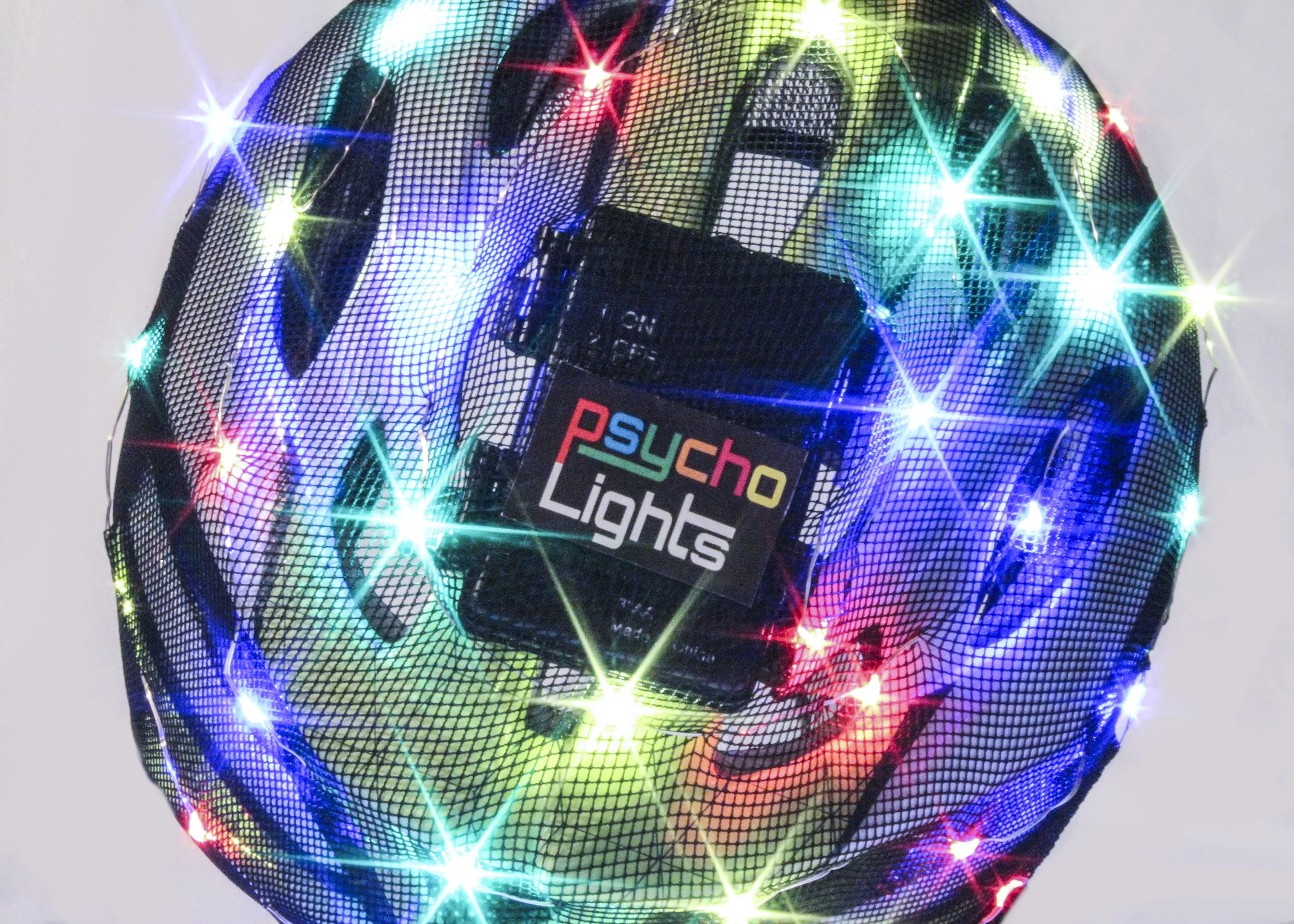 psycholights, a mesh helmet covering with bright lights embedded (top view)