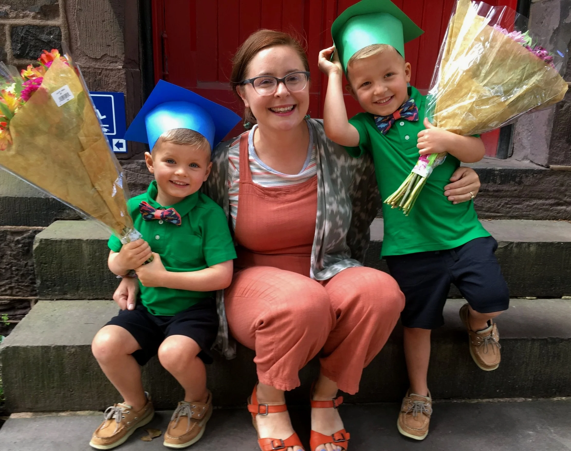 PreK teacher, Kelly Ann Davis with two proud graduates.