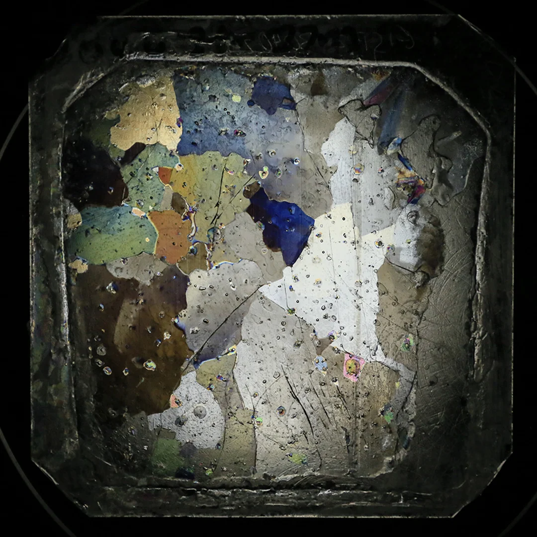 The coloured images are of sections shaved down to approximately 0.5mm thick, with the colours derived from the slightly alternating facade angles of the internal crystal structures.