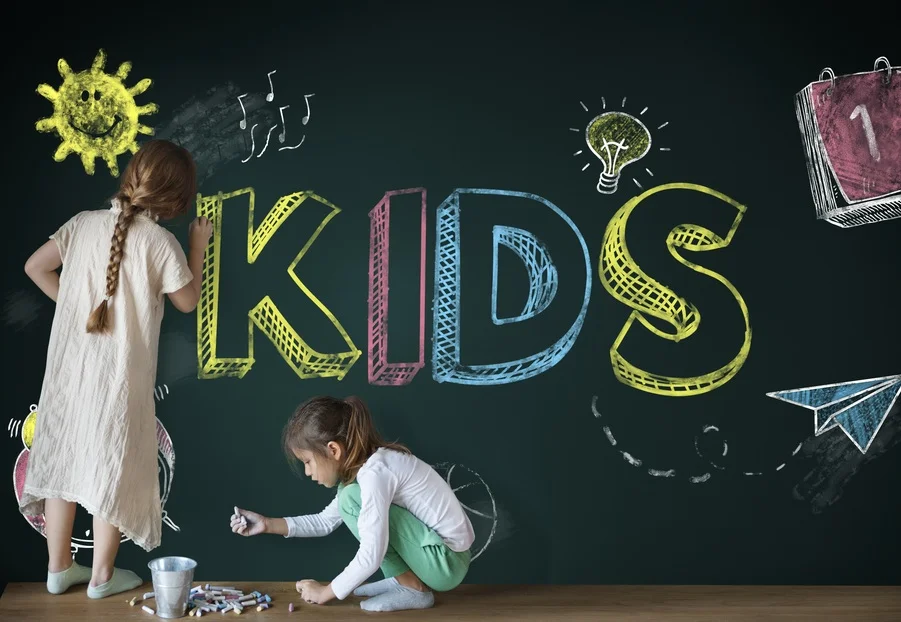 Children drawing on blackboard.jpg