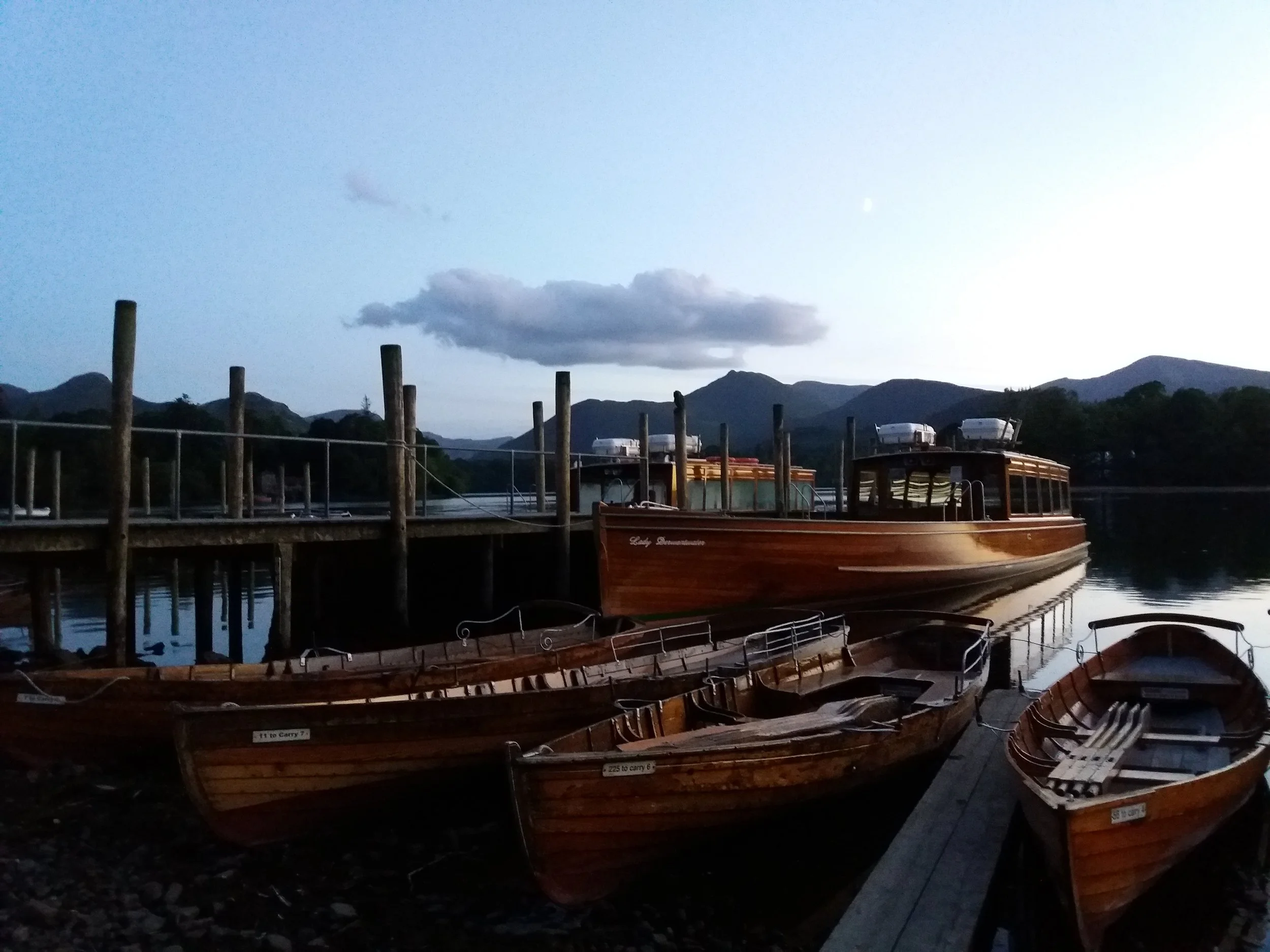 Keswick Launch Keswick Launch sails in the third largest Lake in Cumbria. It is unusual in that it has four islands dotted along its length. Use the launch to explore the lake and surroundings stopping at one of our jetties, leading to excellent walks or stopping to visit a tea room. The cruise is 50 minutes but you can hop on and off the launch back to your point of departure. We also offer rowing and motor boats to hire, for you to explore at your own pace. Lake shore of Derwentwater