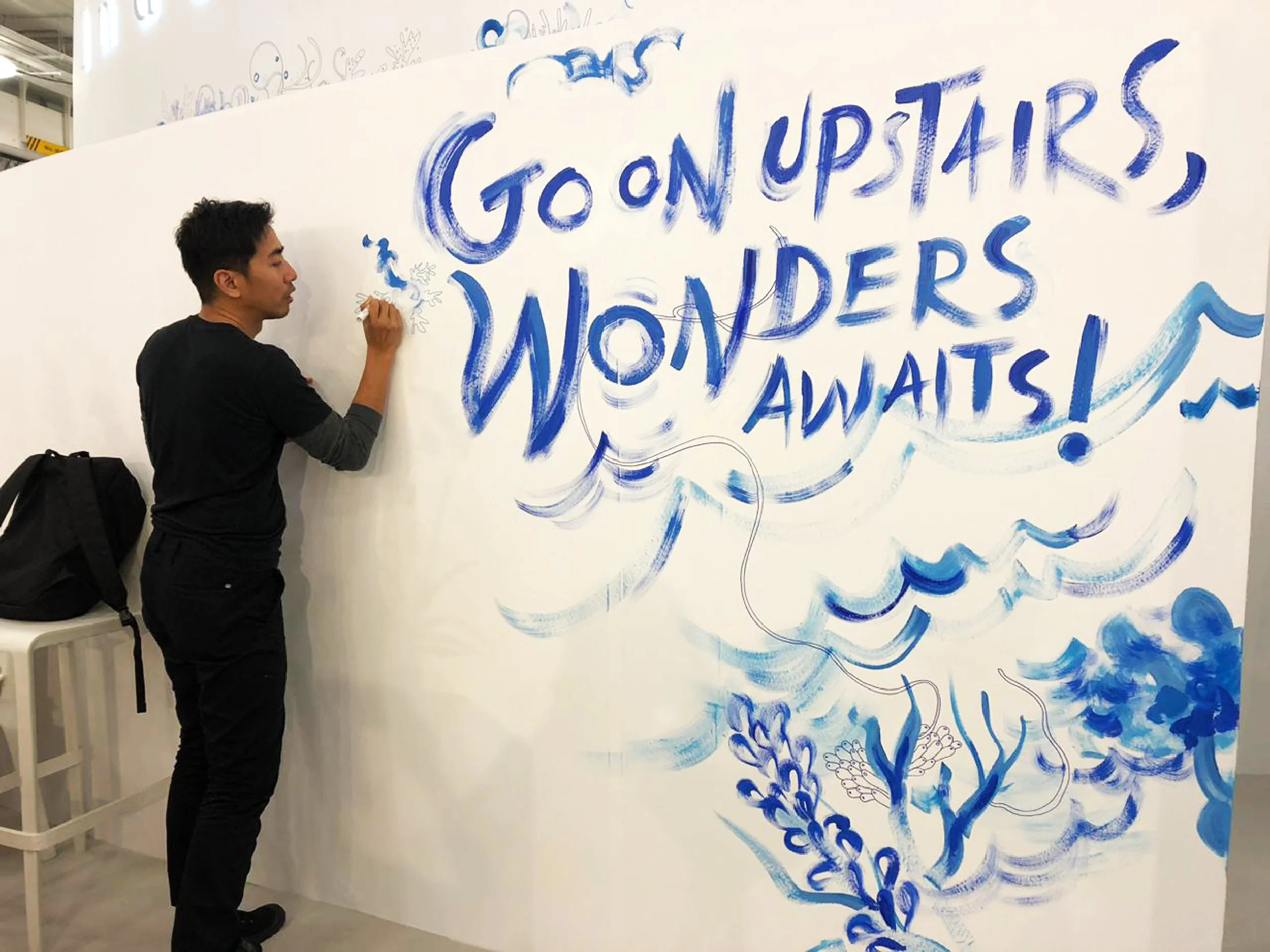 Over the course of the London Book Fair, illustrator and artist Mohammad “Emte” Taufiq created an ocean-themed mural for the Indonesian national pavilion. (Photo courtesy of Siti Gretiani)