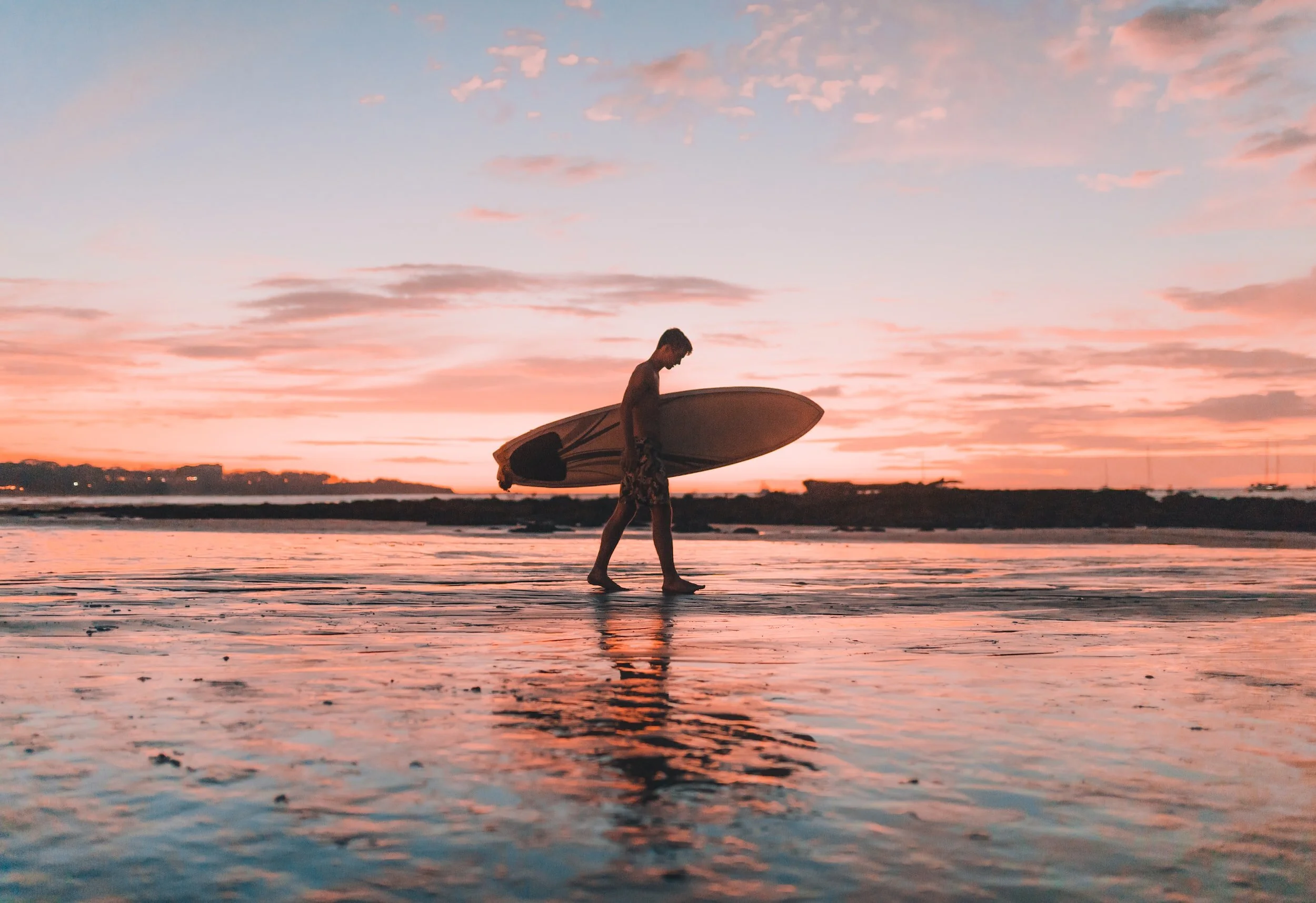 a guy with a surfboard