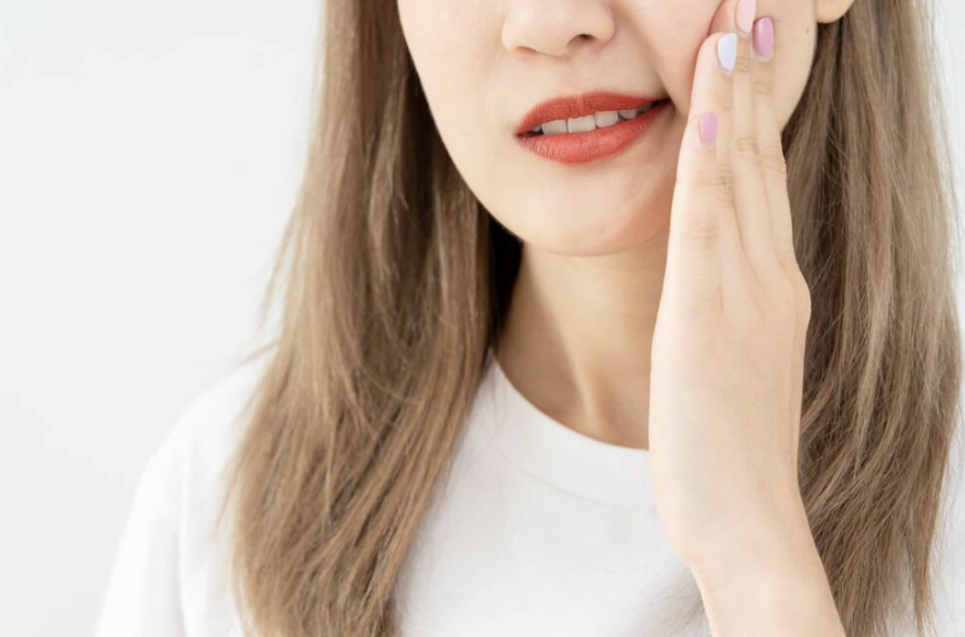 What Are the Most Common Causes of Tooth Sensitivity and How Can You Treat It?