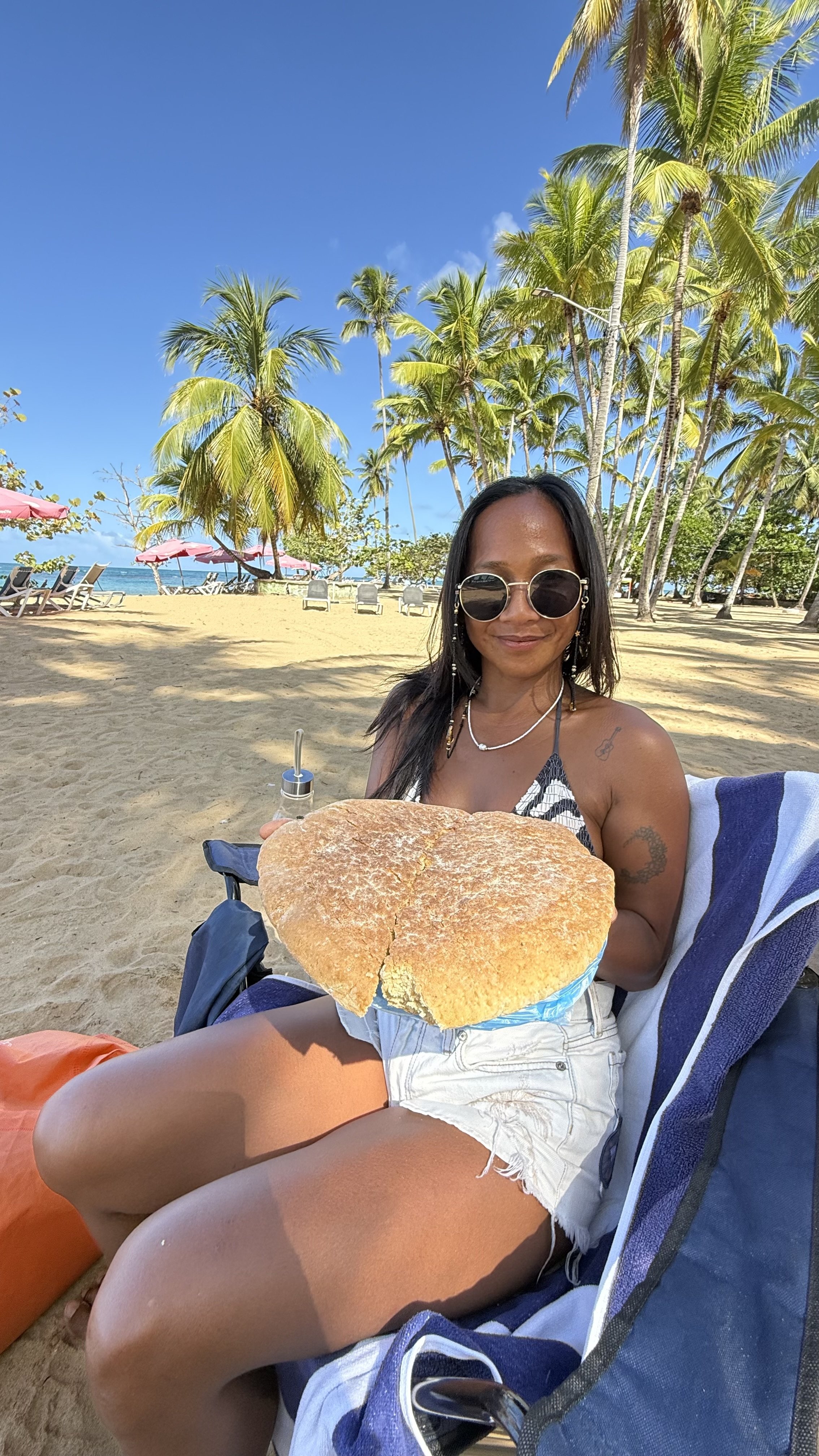 Venus with a fresh loaf of coconut bread (pan de coco)
