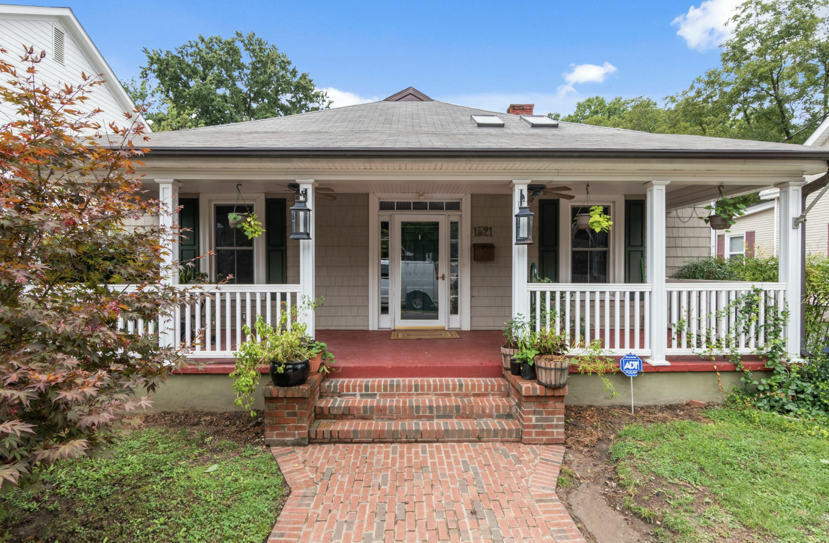 a small house with a large front porch