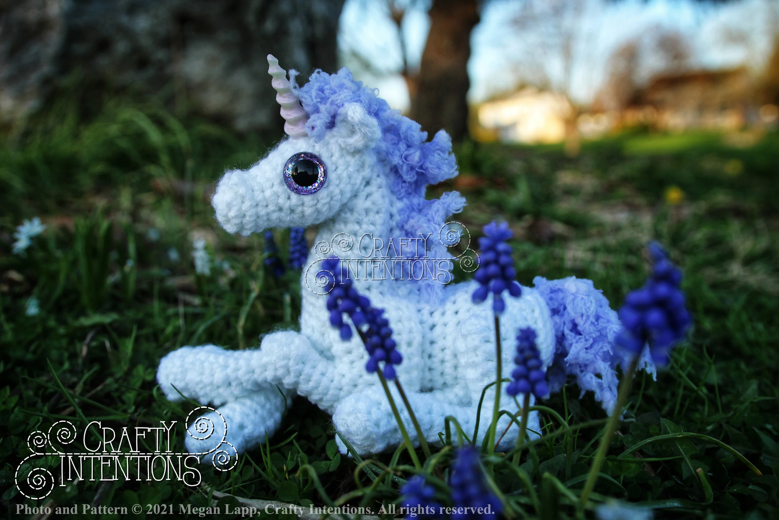IMG_4488-01  Laying Down Baby Unicorn with Lilac Horn and Lilac Tail with Logo and Copyright.jpg