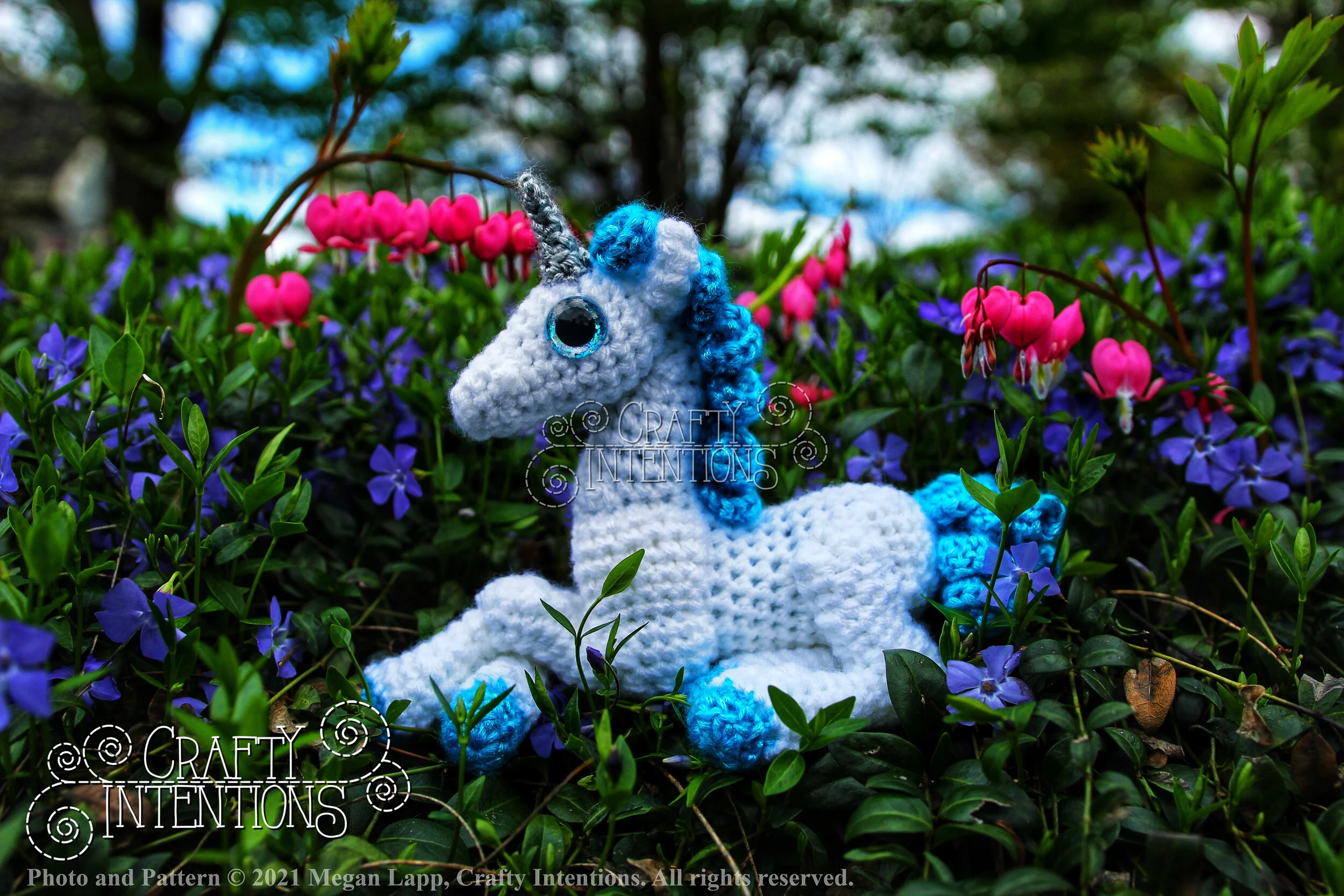 IMG_4591-01 Laying Down Baby Unicorn with Silver Horn and Blue Tail with Logo and Copyright.jpg