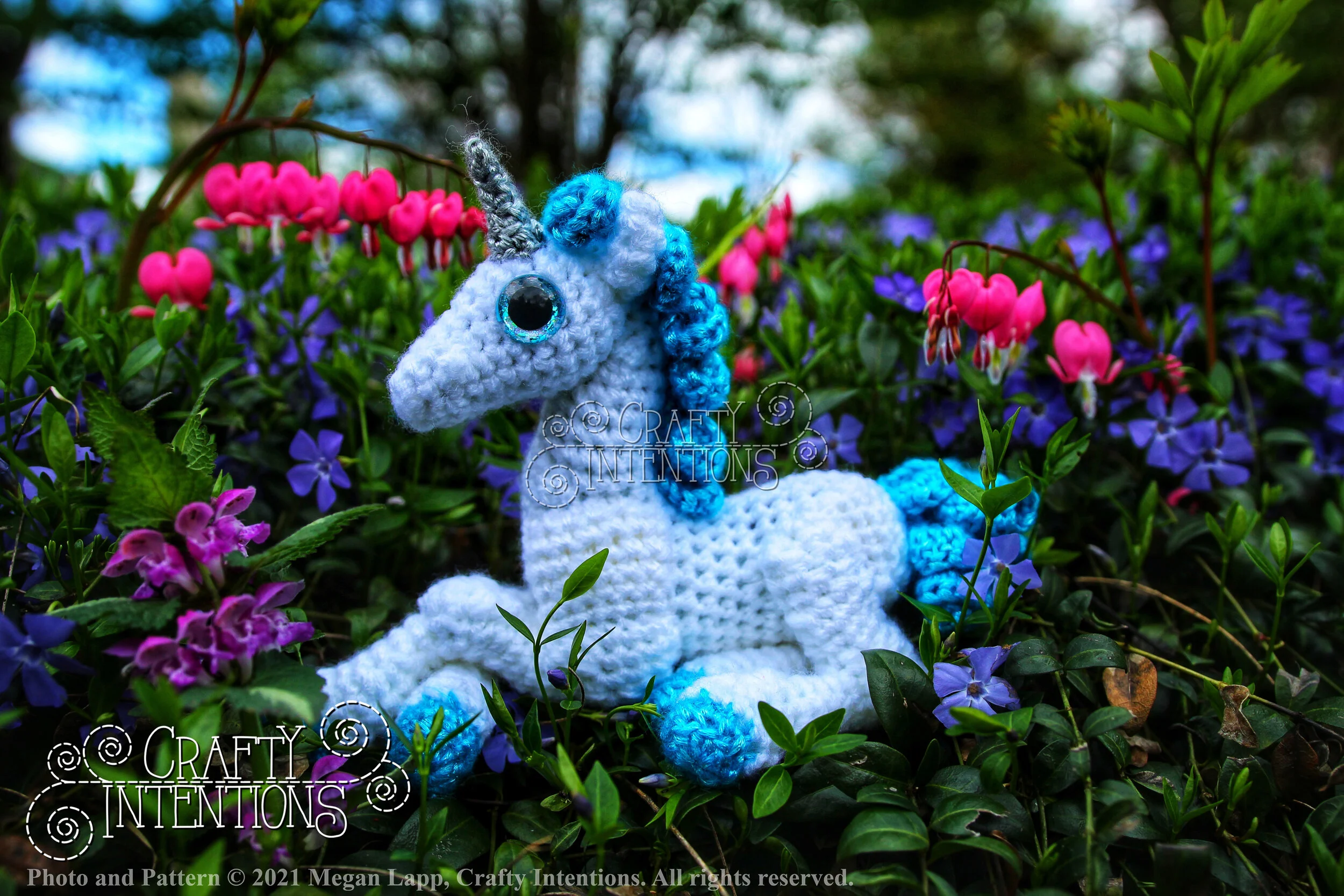 IMG_4610-01 Laying Down Baby Unicorn with Silver Horn and Blue Tail with Logo and Copyright.jpg
