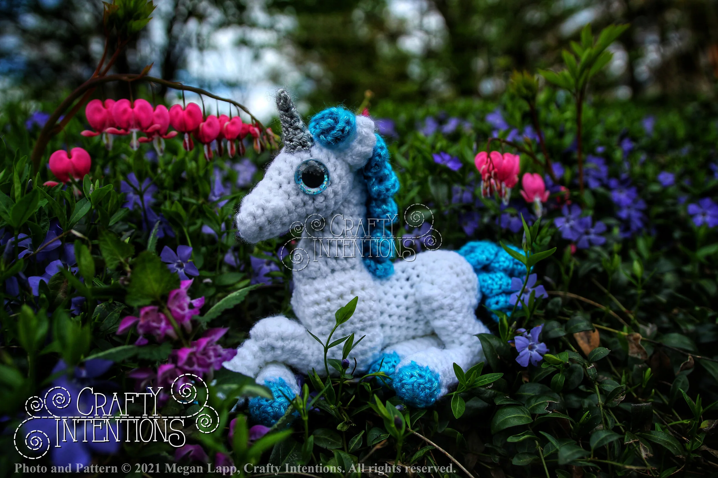 IMG_4617-01 Laying Down Baby Unicorn with Silver Horn and Blue Tail with Copyright and Logo.jpg