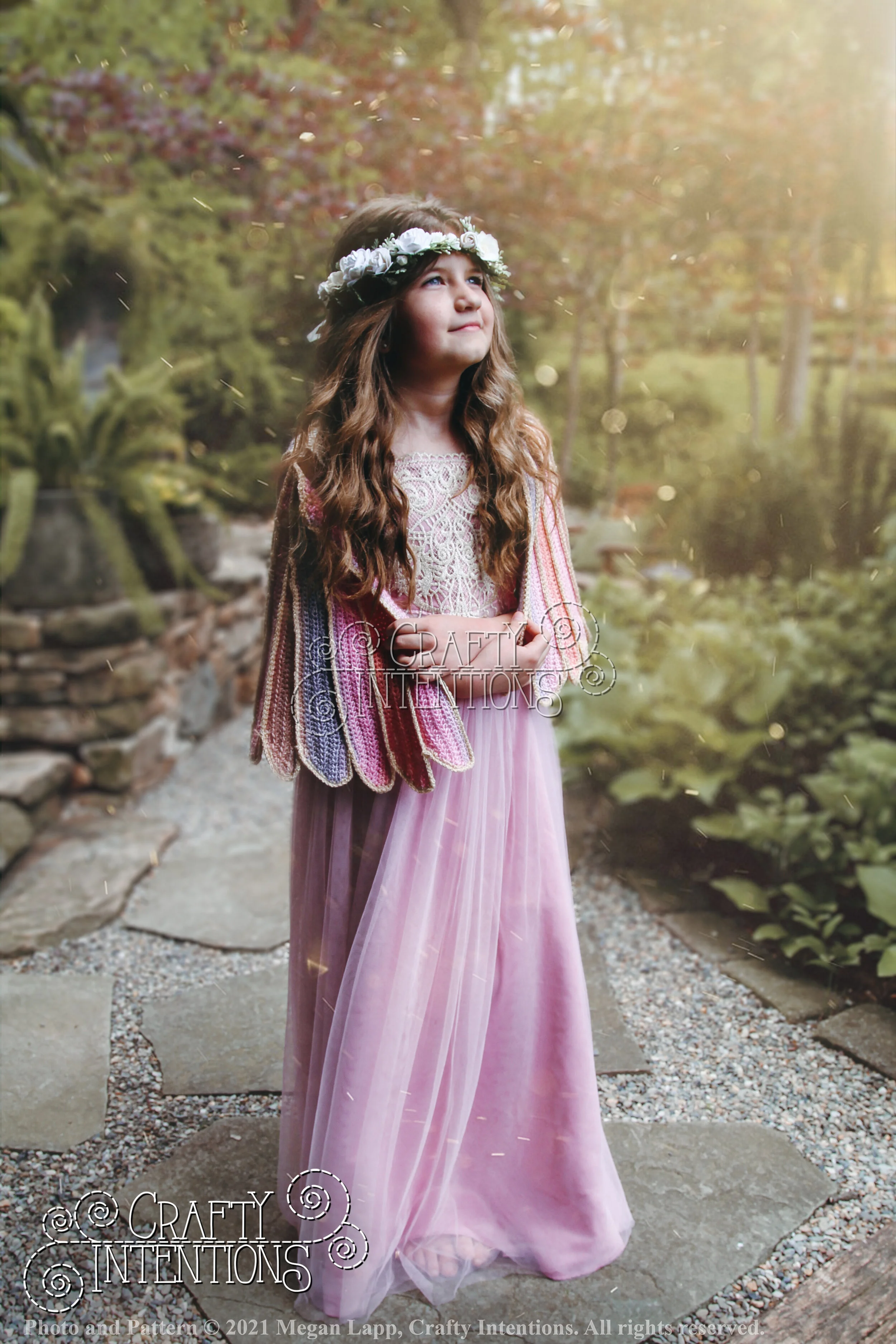 Sunset Wings in pink dress in garden 02 (4) with logo and copyright.jpg