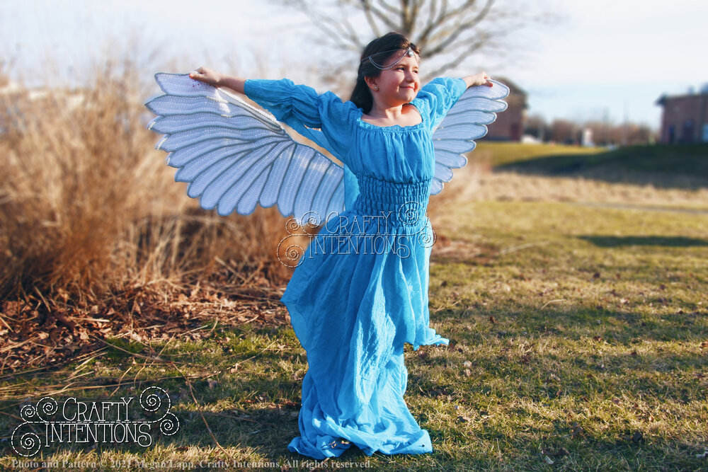 White Wings Blue Dress Edited 02 (2) with Logo and Copyright.jpg