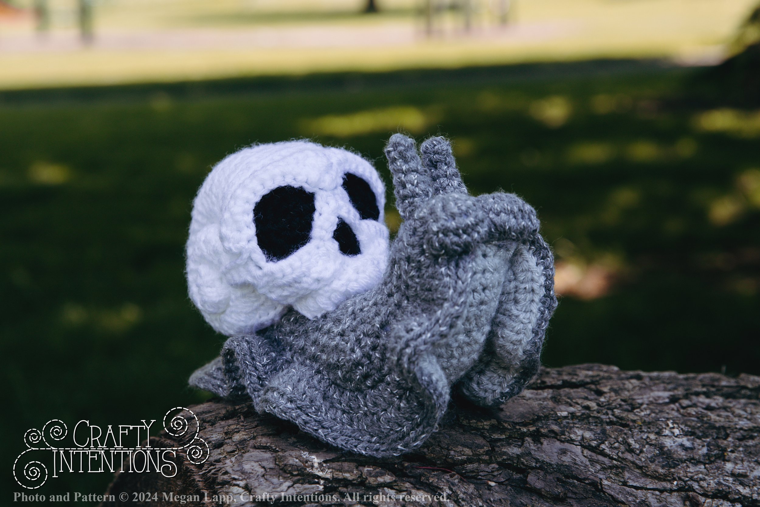 IMG_1799-Edited Skull Snails with logo and copyright.jpg