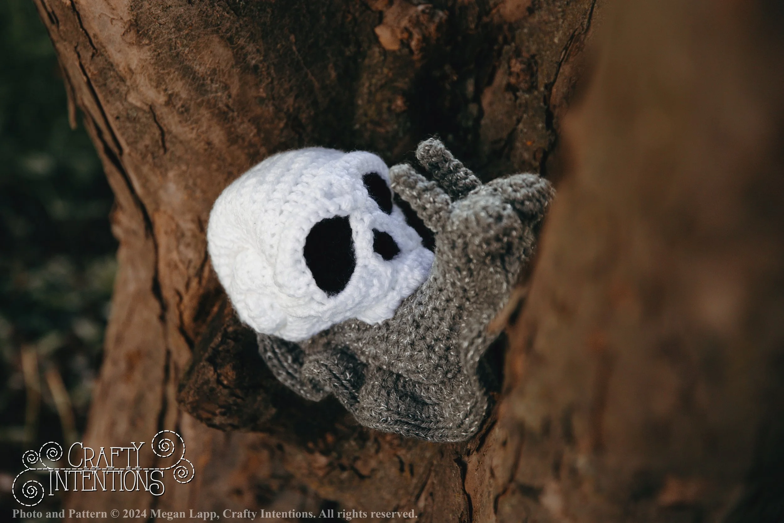 IMG_1846-Edited Skull Snails with logo and copyright.jpg
