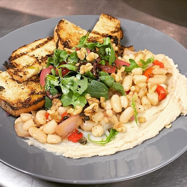 Happy FriYAY! The kitchen is mixing up some tasty dishes for you this weekend! Come try this Vegan friendly, health conscious, Summer White Bean Salad &mdash; with rosemary, crispy capers, pickled red onions, arugula and balsamic. It&rsquo;s sure to 