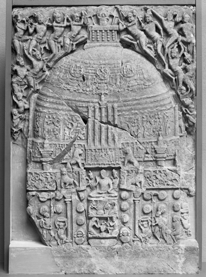 The other side, re-carved at a later date, depicting the more familiar, seated Buddha figure Slab from the wall of a stupa , about 3rd century A.D. (obverse) Museum of Fine Arts, Boston