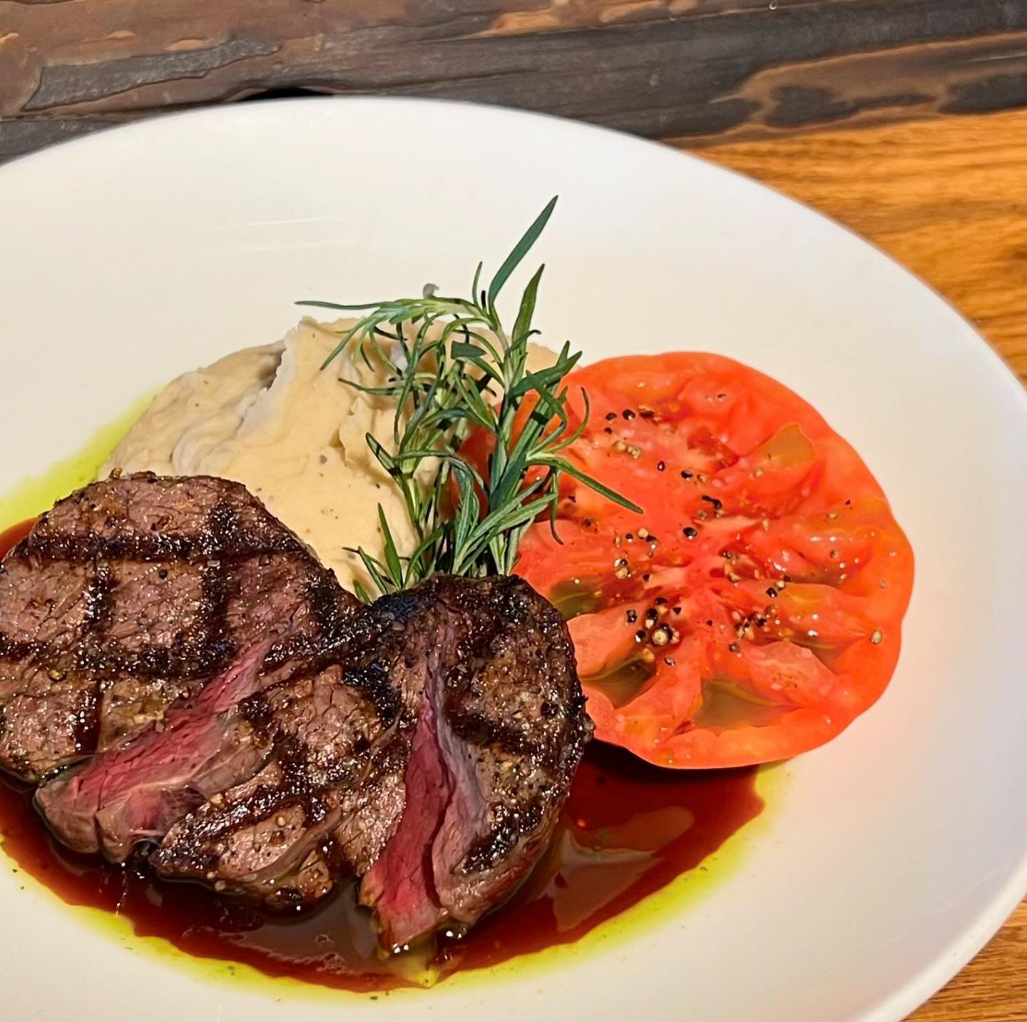 FLAVOR ALERT! Southern Style Butterbean and Rosemary Mash, Giant Vinaigrette Marinated Tomato Slice, Grilled Beef Tenderloin.  Summer grill on a plate&hellip;#now #NEW menu item #lodgestyle