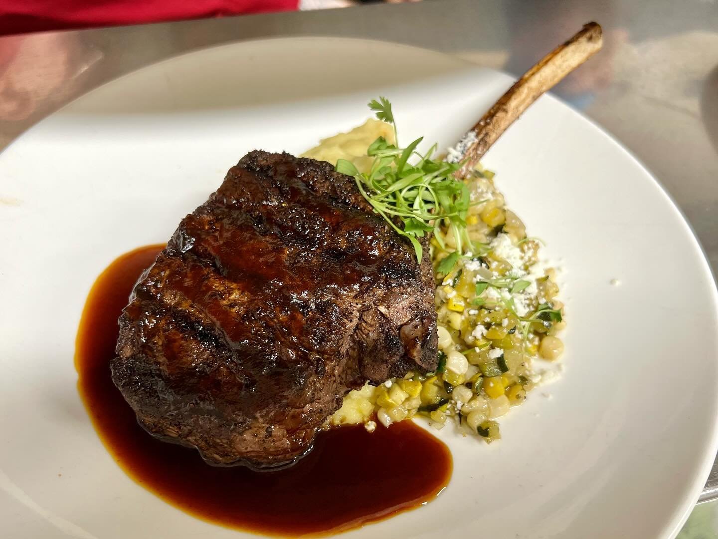 FAN FAVORITE!  Grilled NM Elk Chop accompanies our Green Chile Whipped Potatoes and Calabacitas. #lodgestyle #wildgame #elk #lunch #dinner #glutenfree