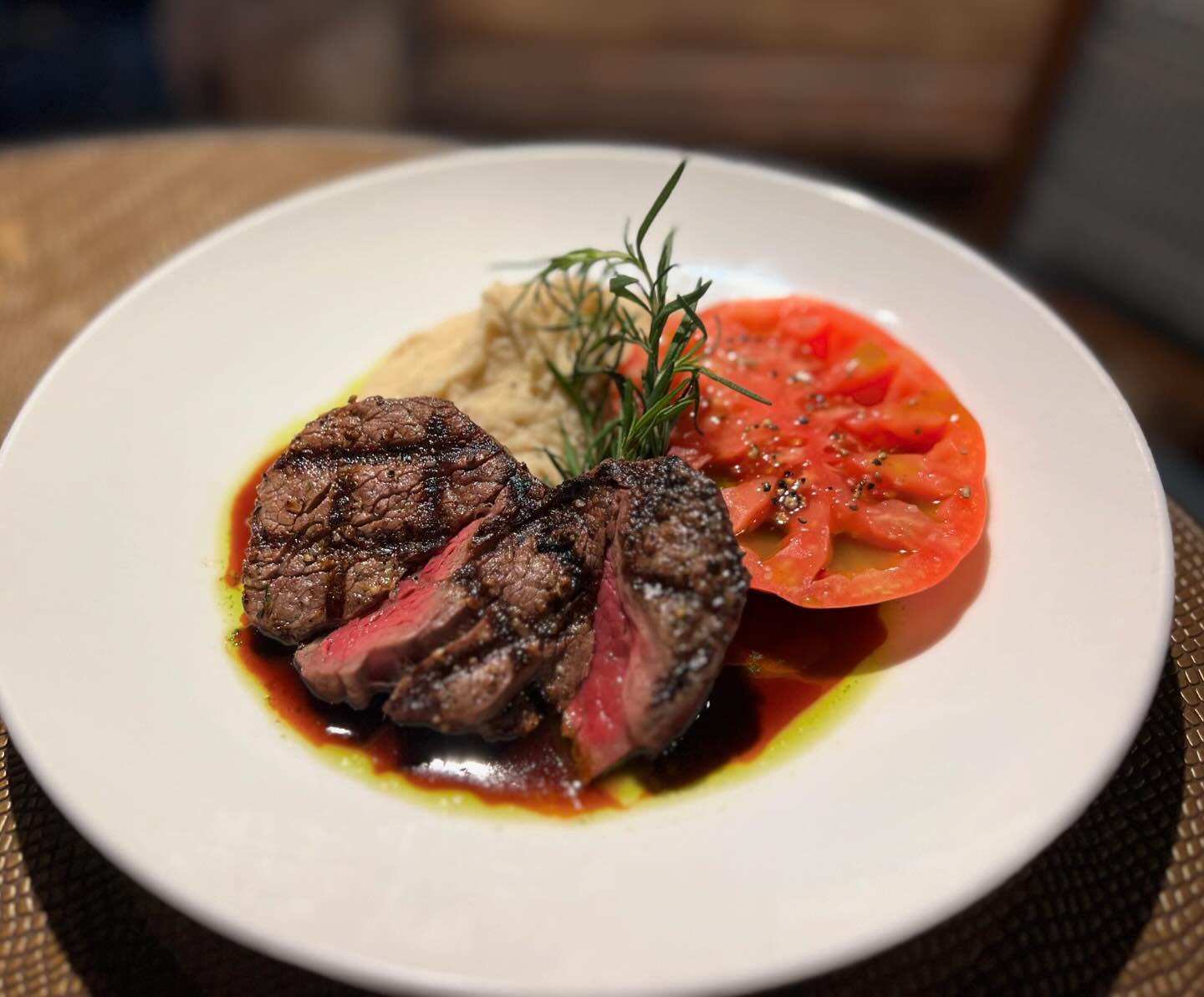 We are big fans of summer flavors, this Grilled Beef Tenderloin with Marinated Garden Tomato and Butterbean Rosemary Mash hits the spot! Pop over this weekend for your taste #lodgestyle #dinner #sundayfunday #ingredientsmatter #simpleanddelicious
