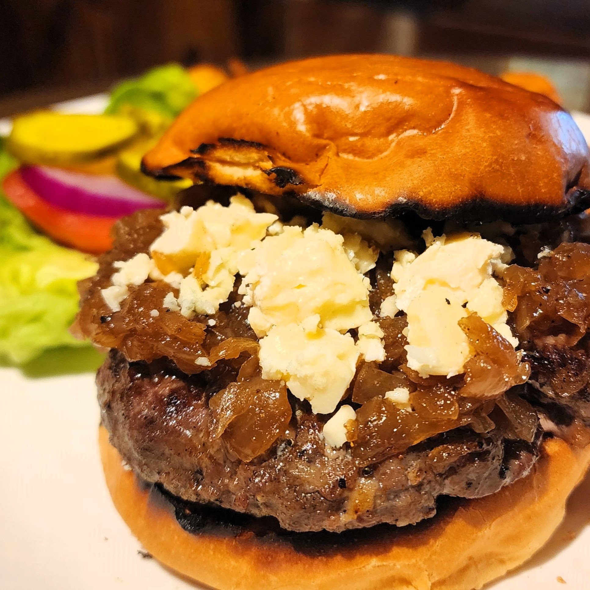 Something new for #burgerFriday. Smoked onions and blue cheese on our famous #wildgame burger this Friday at lunch while they last. Still only $15! Book a table now at rainbow-lodge.com.