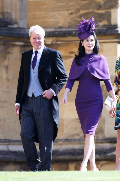 Charles Spencer, 9th Earl Spencer and Karen Spencer arrive at the wedding of Prince Harry to Ms Meghan Markle at St George's Chapel, Windsor Castle
