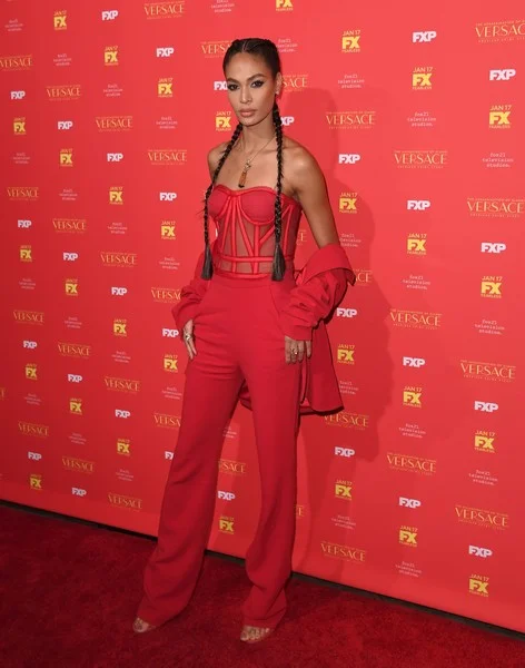 Joan Smalls attends the premiere of "The Assassination of Gianni Versace: America Crime Story"