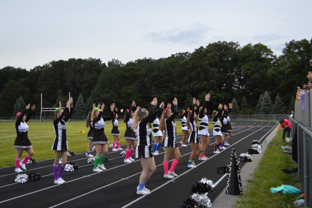 Under the Lights Cheer.jpg