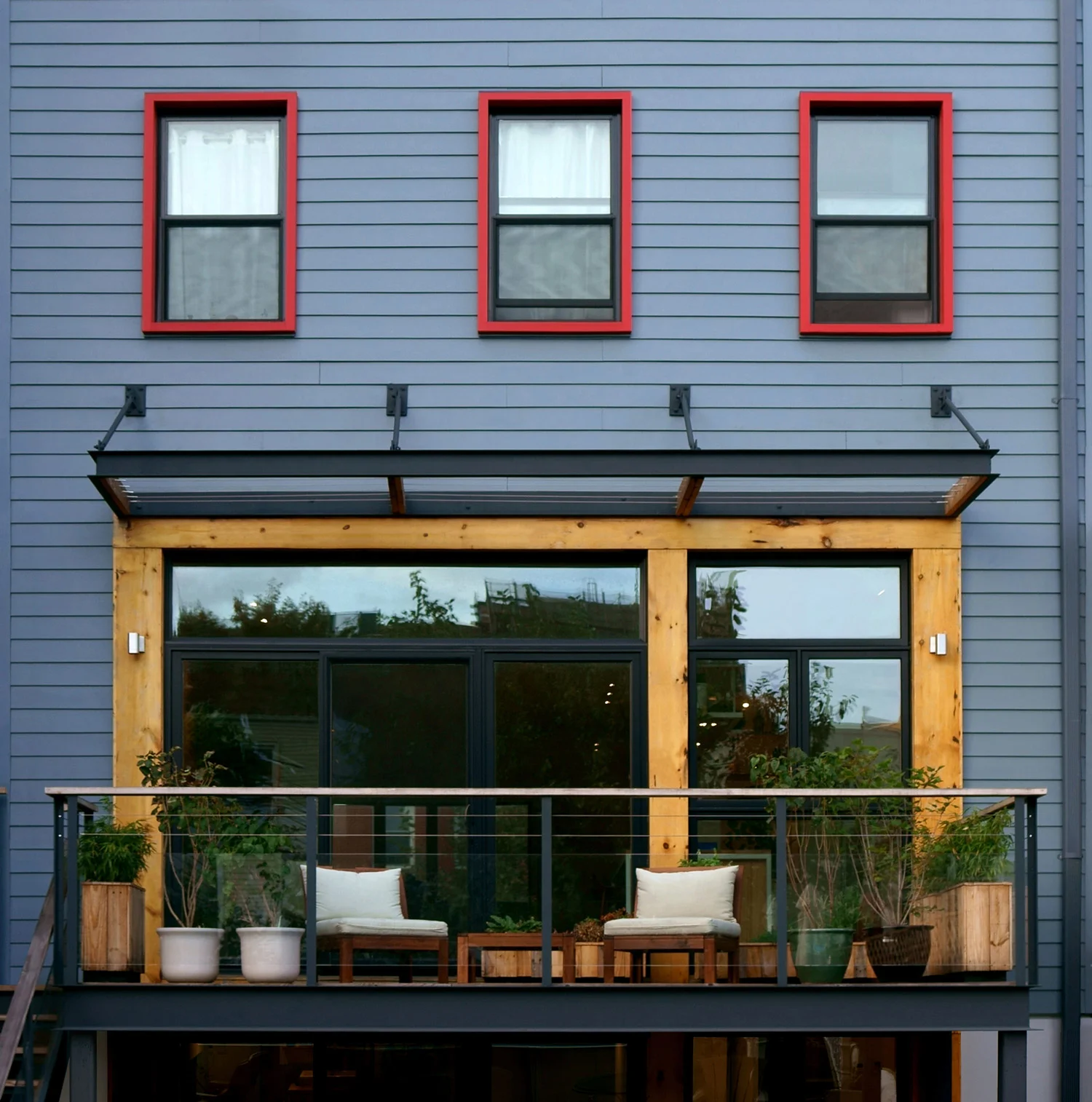 Brooklyn Townhouse Renovation - Red Window Frames at Rear Wall and Steel & Wood Deck