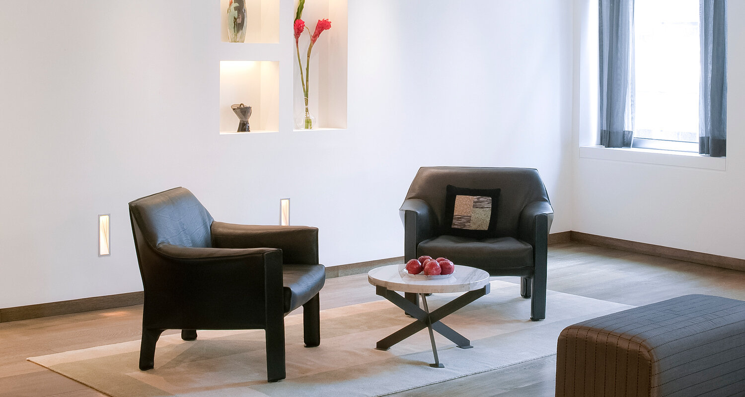 NYC, WEST VILLAGE, LOFT RENOVATION - View of living room luxury armchairs.