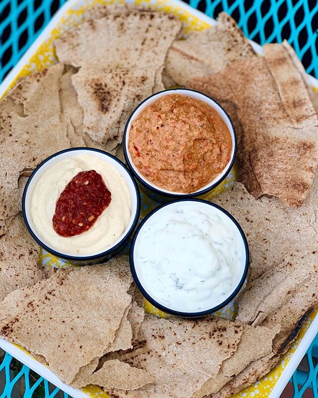 Mediterranean Mezze Platter = the perfect lazy summertime dinner. We snagged some whole wheat pita, hummus &amp; tzatziki from our local Mediterranean deli and whipped up homemade muhammara (red pepper &amp; walnut dip) to go with it. DIPS 👏 FOR 👏 