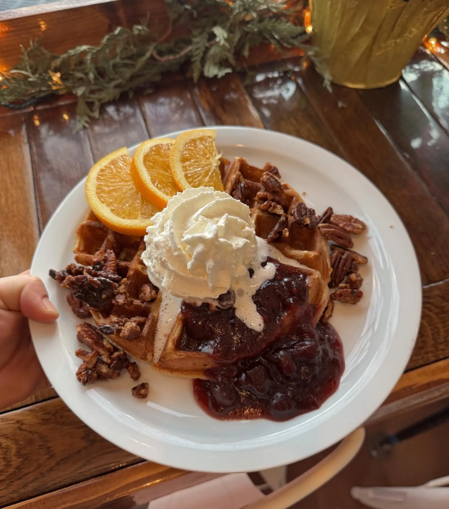 New year - new waffle! Introducing Cran-Orange Bliss 🍊 Our new Whole Wheat Sourdough waffle topped with cranberry compote, candied pecans, orange slices and whip cream. Absolutely, delicious!