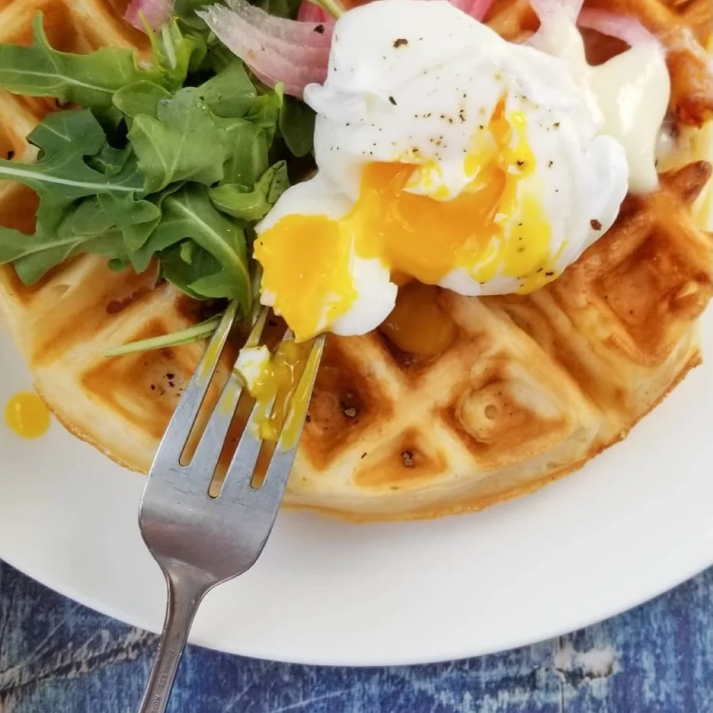 How to make a perfectly poached egg: 
-
-
First, must use a fresh egg. Bring a pot of water to boil, then turn to medium/low heat. Add a dash of white vinegar to the water. Make a whirlpool using a spoon, then crack the egg and lower gently in the wa