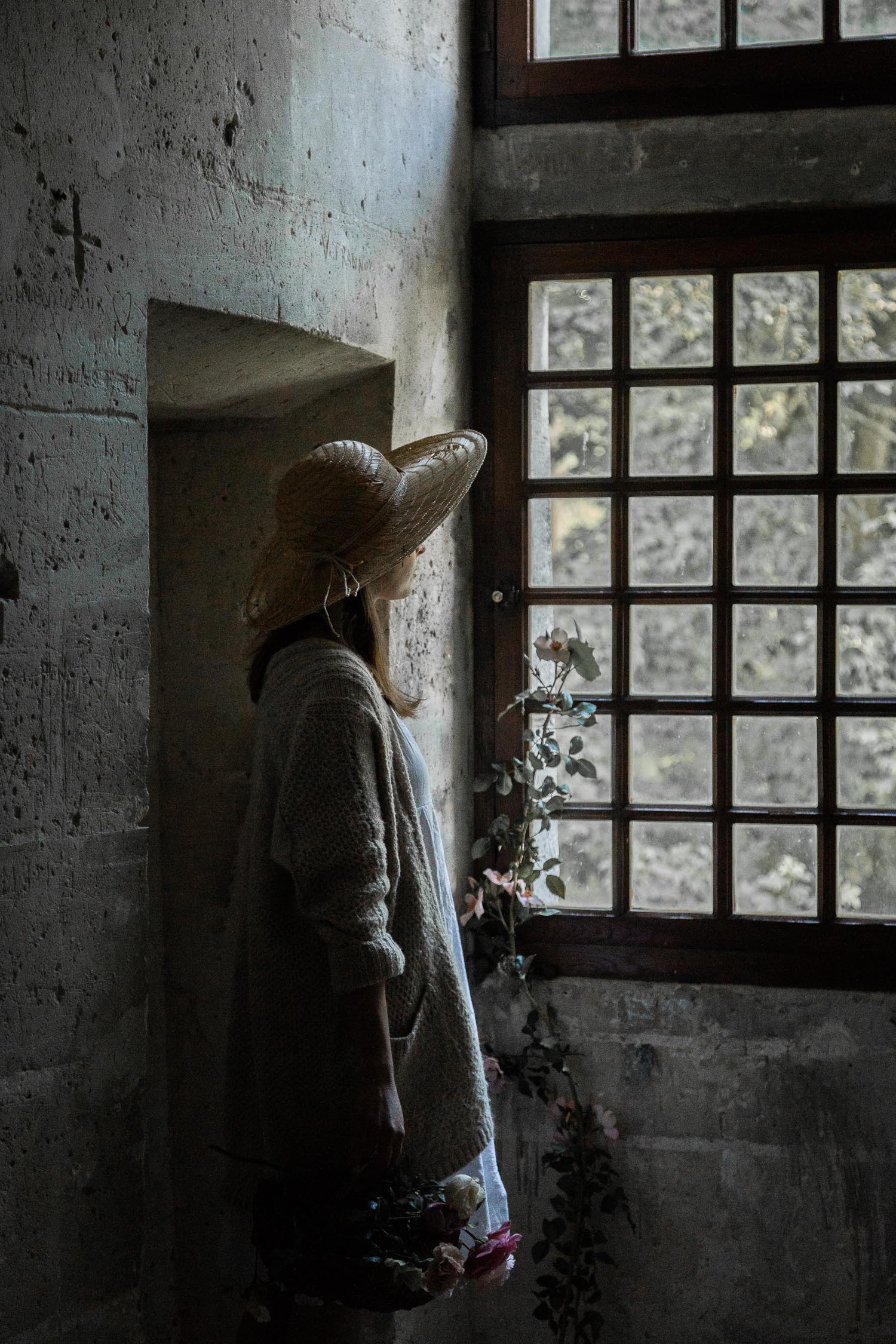 Champagne-portrait-of-lady-looking-out-the-window-France-6599.jpg