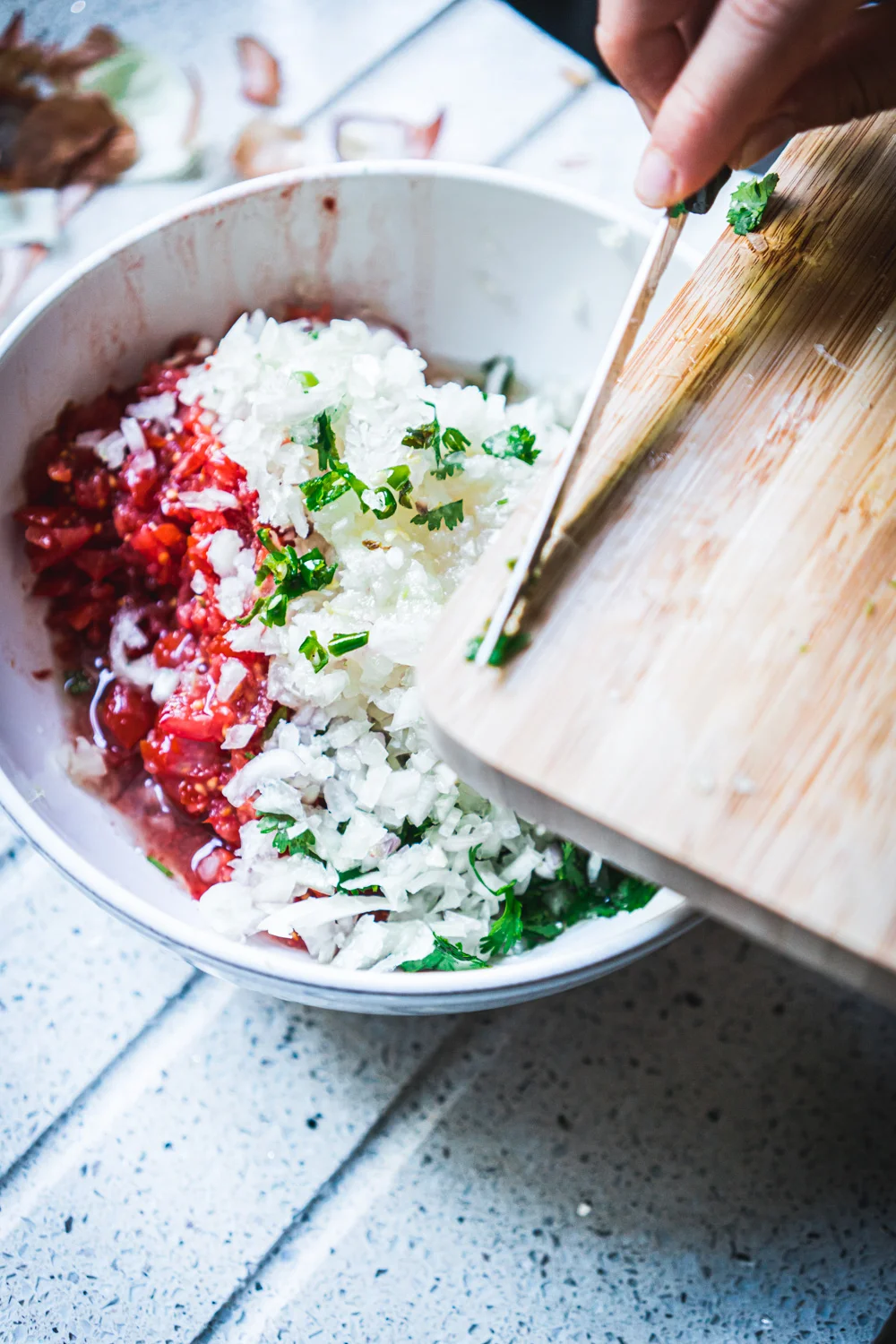 Adding-green-chillies-to-the-salad.jpg
