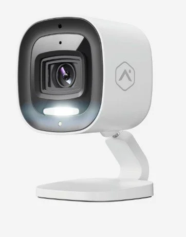 Alarm.com ADC-V530 indoor security camera on an adjustable stand.