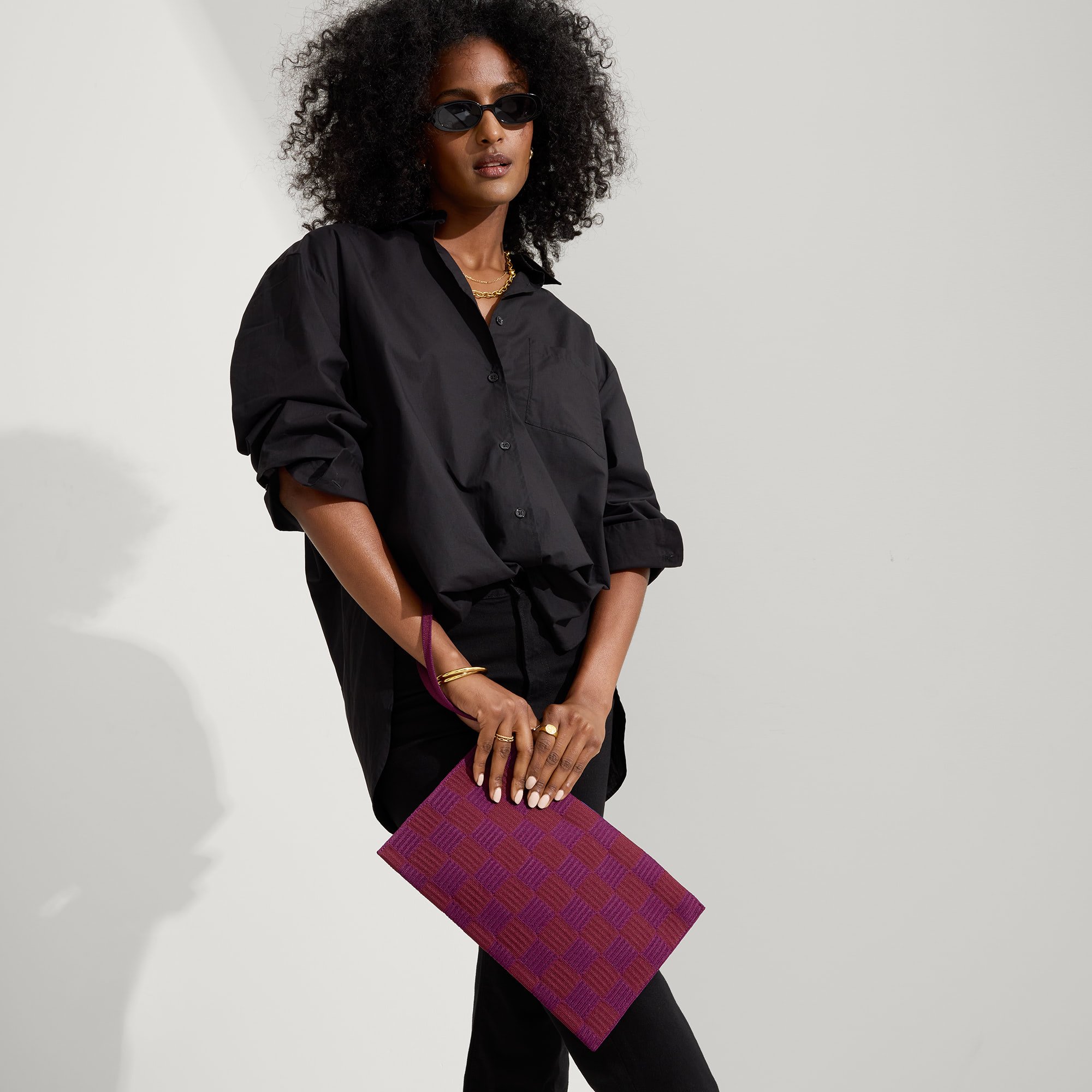 093_Wristlet_Checker Plum_On-Figure_2055.20240625235758066.jpg