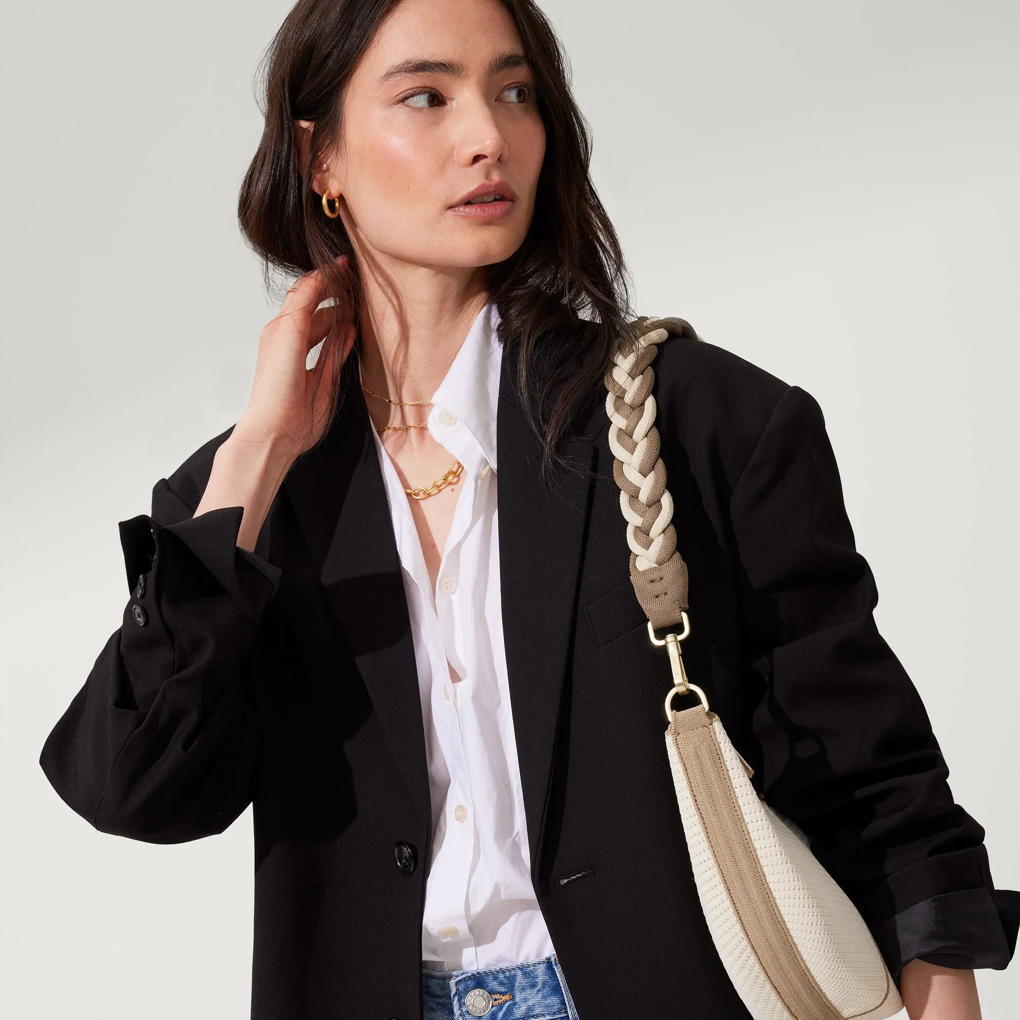 166_TopHandleBraided_CreamandCocoawithCrescentBag_OnFigure_4447.webp
