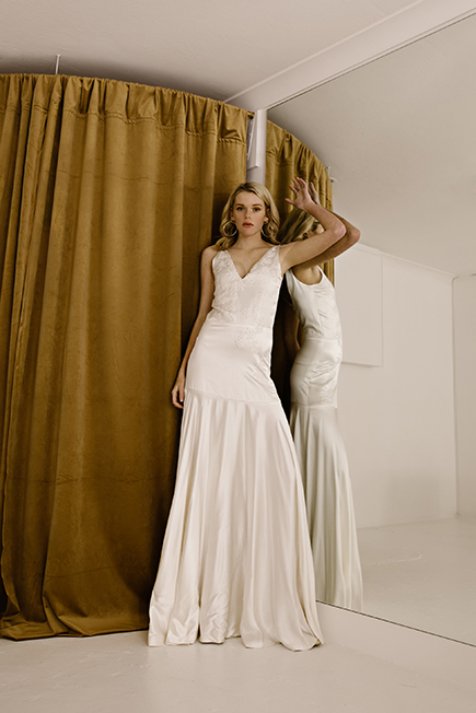 Delocae embroidery on this fitted wedding dress is stunningby L'eto Bridal 