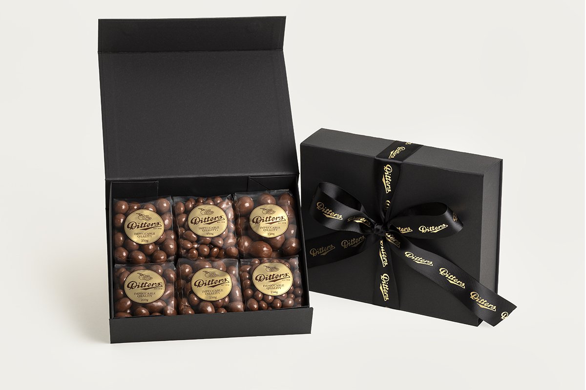 Ditters milk chocolate gift hamper finished with black and gold ribbon