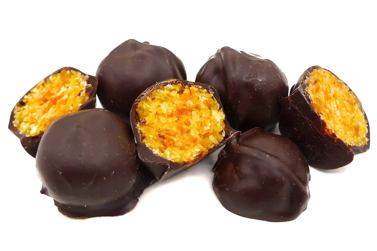 Dark Chocolate Apricot Cocktail featuring a soft apricot and coconut centre coated in smooth Belgian dark chocolate.