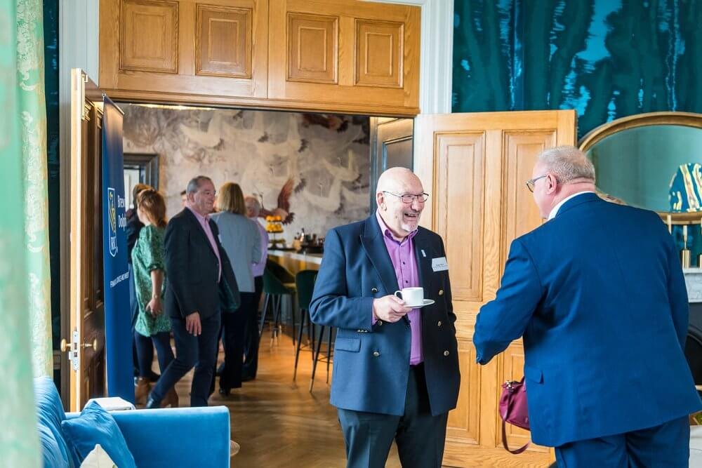 Men chatting at conference