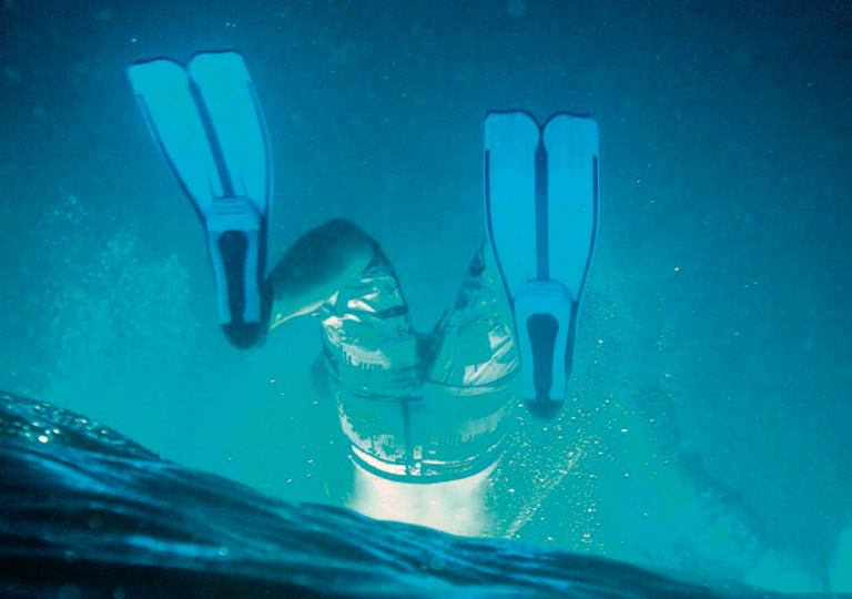 man-upside-down-in-ocean-tyson-jopson.png