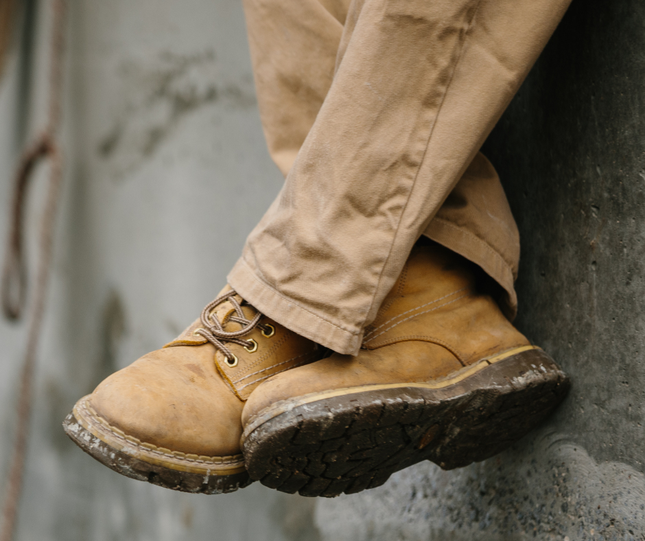 person wearing construction boots